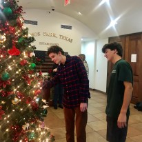 OPYC founders Sam Spezia-Lindner and Henry Satel admiring City Hall's new Christmas ornaments
